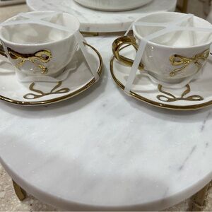 Elegant White and Gold Teacup Set